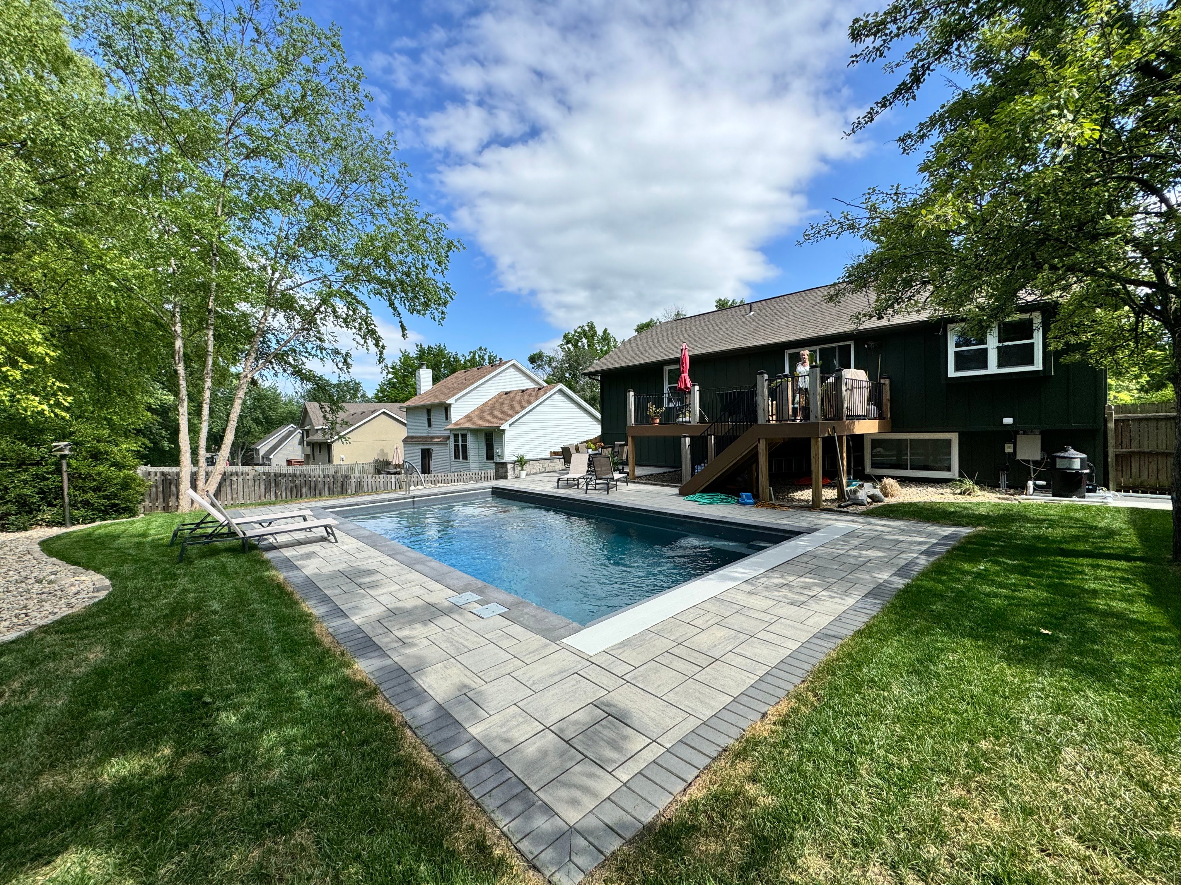 Fiberglass pool with paver deck