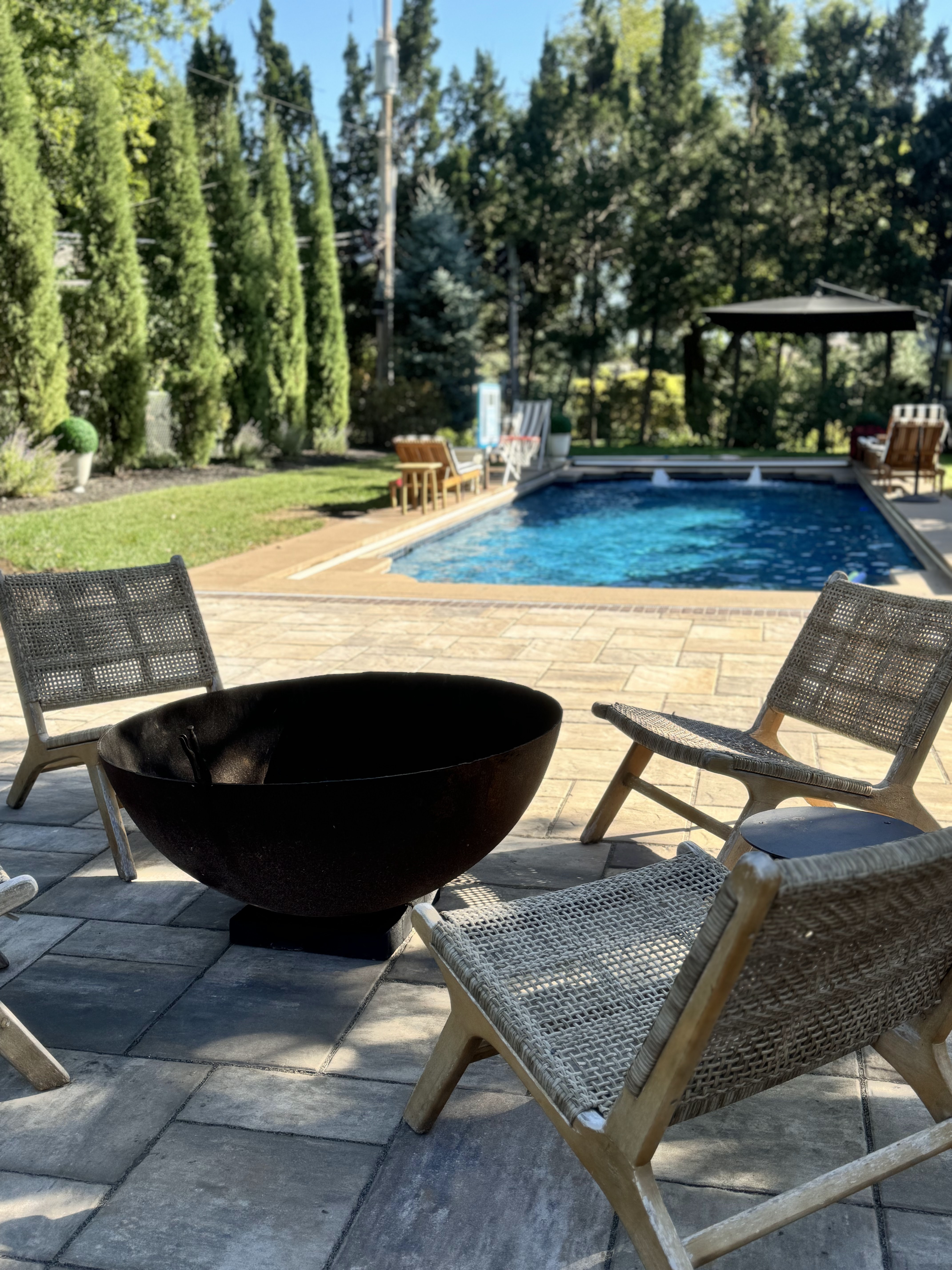 Poolside fire bowl patio